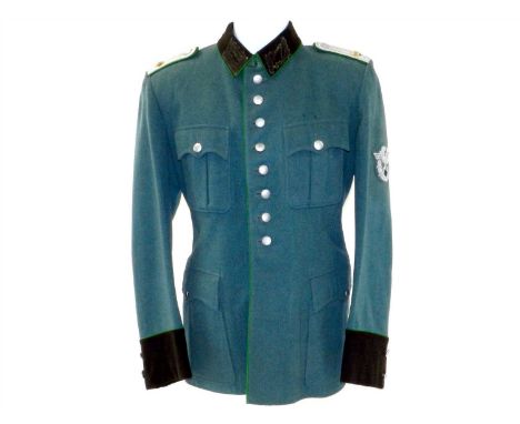 A German Police Officer’s tunic for an Oberleutnant in the Schutzpolizei constructed of police green gabardine with sewn rank