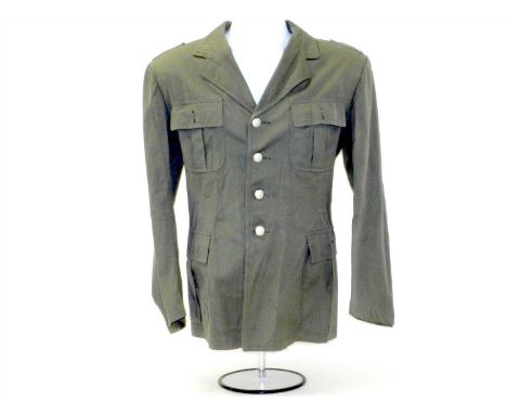 A German Third Reich Summer Field Blouse or Tropical Tunic constructed of sage green canvas drill, with four pleated pockets 