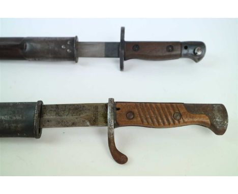 A 1907 pattern British sword bayonet and scabbard by Wilkinsons together with a German 1895/05 ‘Butcher’ bayonet and scabbard