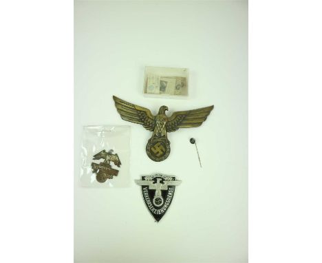 A NSKK Verkehrserziehungsdienst Armabzeichen (Traffic Education Service Badge) together with bronzed German Third Reich eagle