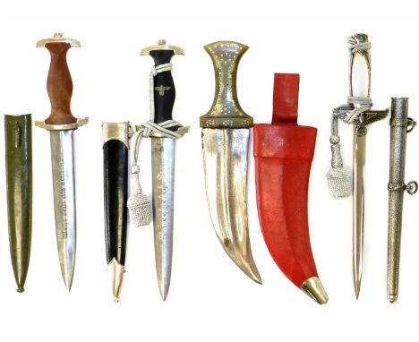 German reproduction daggers - comprising a NPEA Student dagger and scabbard, the blade inscribed 'Wehr Sein Als Schienen' tog
