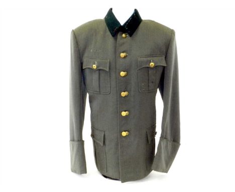 A German Third Reich Army tunic, a private purchase manufacturered by Arthur Kuck, Berlin constructed of field gray wool with