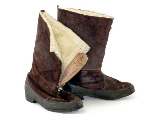 A pair of World War II RAF air crew flying boots with zip-up fronts with sheepskin interiors and Air Ministry stamp, named to