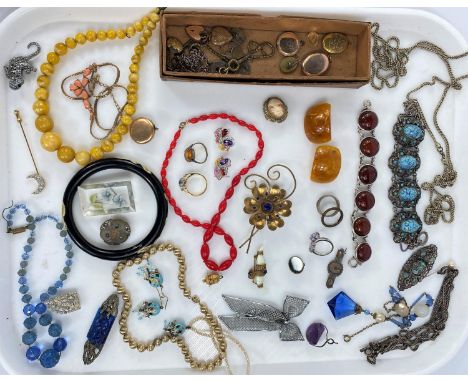 A selection of vintage and costume jewellery including bead necklaces, bracelets, brooches etc (in biscuit tin) 