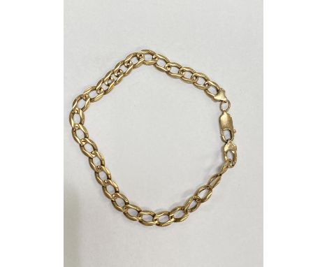 A yellow metal curb chain bracelet stamped 375, 15gms 