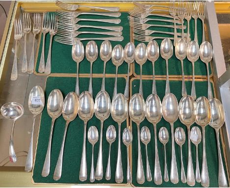 A part canteen of hallmarked silver rat-tail cutlery including 12 tablespoons; 11 dessert spoons; 7 teaspoons; 11 dinner fork