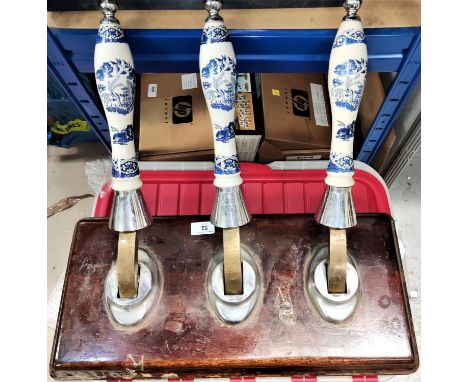 2 bar mounted blue and white ceramic beer engine handles 