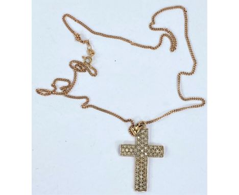 A diamond set 9 carat hallmarked gold cross pendant on fine curb chain stamped 375, 7.6gm 