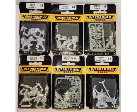 Six early 1990's Games Workshop Citadel Miniatures Warhammer 40,000 metal Space Ork figures in blister packs, Blood Axe Komma