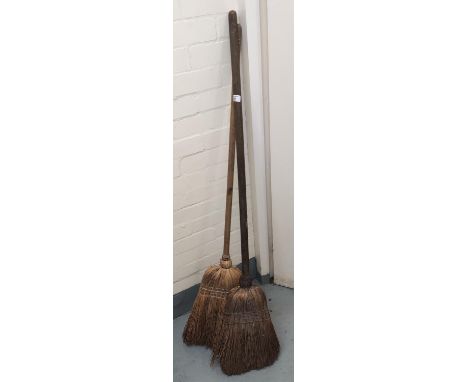 Two vintage wooden brooms 