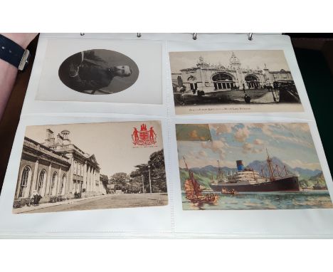 An album of vintage postcards, various military, humour etc 