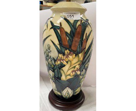 A modern Moorcroft baluster table lamp decorated with bamboo, lilies etc against a yellow ground 