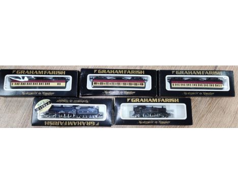 Two boxed Graham Farish N-Gauge locomotives and three coaches boxed 