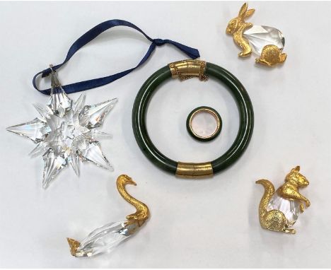 A yellow metal bound jade coloured hardstone bangle and ring; a Swarovkski style star pendant and animals etc 
