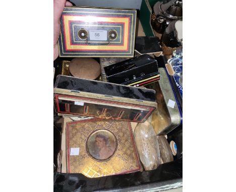 A selection of vintage money boxes and other tins and a 19th century copper tea caddy 