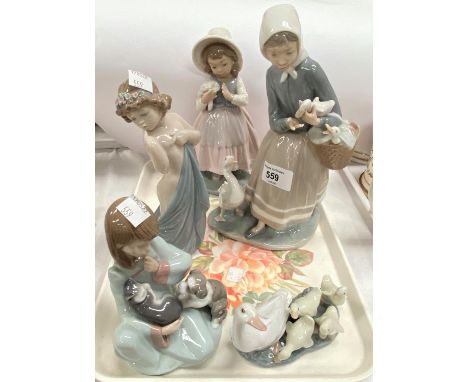 4 LLadro groups and a Nao figure.&nbsp; Good condition.