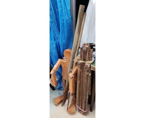 2 19th century hedging tools; 2 easels; a wooden figure of a man etc 