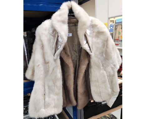 A ladies mink jacket; a blonde wrap 