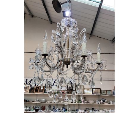A French six branch crystal chandelier (rewired) 69 x 66cm (excluding chain). 