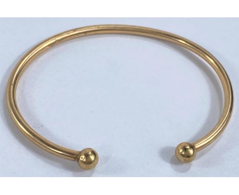 A 9 carat hallmarked gold slave bangle, 4.7 gm 