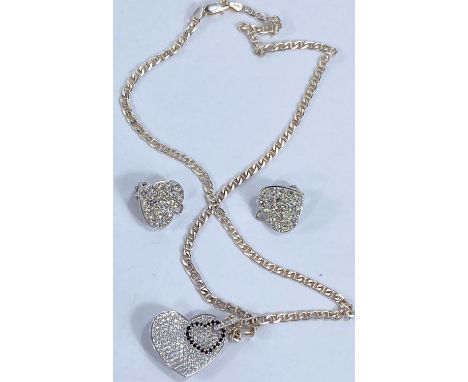 A white metal heart pendant set diamonds and sapphires, stamped 'D174, 0.26, K18', 4.8 gm, on white metal chain; a pair of si