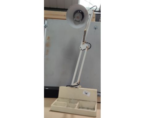 A white angle poise lamp 