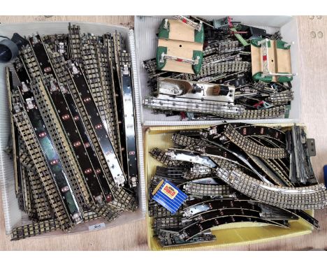 A large selection of Hornby 00 gauge tinplate track etc with three rails 