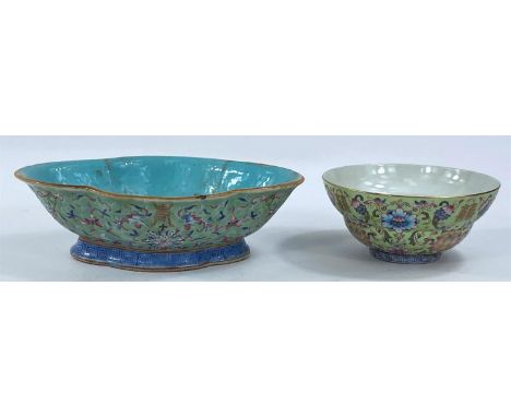 A Chinese porcelain bowl with stylised floral decoration on green ground, seal mark, 12cm (restoration to foot); and a simila