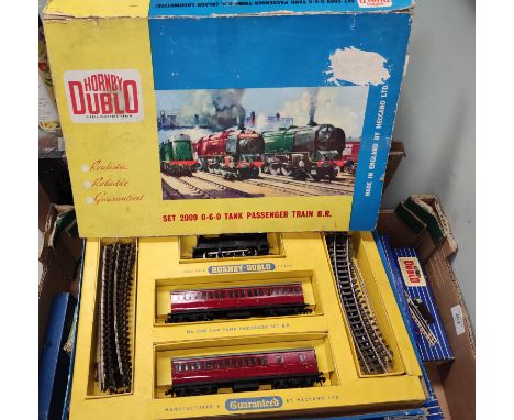 A Hornby boxed set of tin plated passenger train and a selection of boxed vintage dublo gauge track etc 