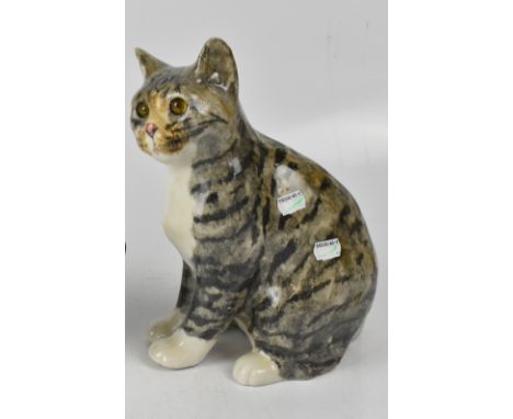 A Winstanley ceramic model of a tabby kitten with glass eyes, signed to base and numbered 6, height 31.5cm.