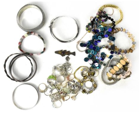 A quantity of mainly contemporary costume jewellery to include various necklaces, yellow metal bangle set with small white st