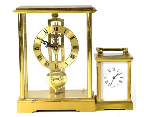 A French brass cased carriage clock, the white enamelled dial set with Roman numerals, the movement case stamped ACG, and a m