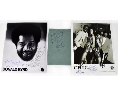 CHIC; a black and white photograph bearing signatures of the band members, a piece of paper bearing the signature of Marvin G