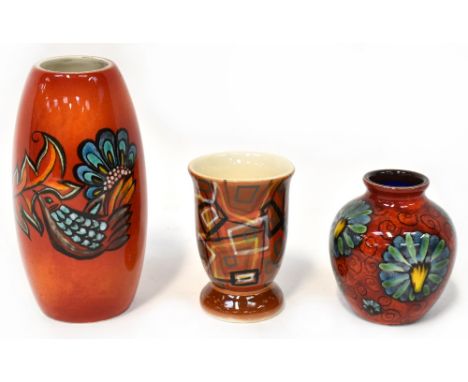 POOLE; three non-matching vases, all designed by Lorna Whitmarsh, a tall cylindrical vase with multi-colour bird decoration, 