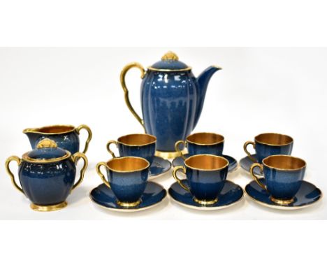 CARLTON WARE; an early/mid-20th century coffee service, midnight blue mottled glaze and gilt-heightened, with gilded interior