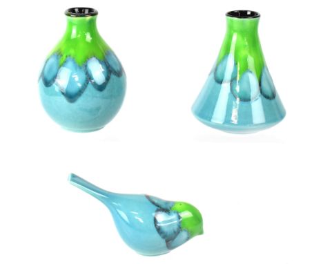 POOLE; a bud vase, a conical bud vase, height 14cm, and a decorative bird, length 16cm, all in the 'Tallulah' pattern (3).