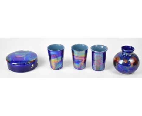 POOLE; five ceramics in the 'Galaxy' pattern each on an iridescent indigo ground to include three small vases, height 9.5cm, 