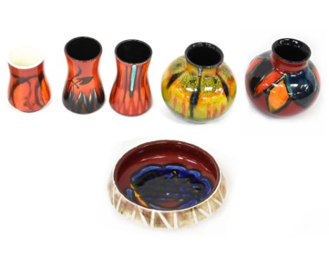 POOLE; a group of six non-matching ceramics to include two squat baluster vases, one in 'Safari' pattern, height 11.5cm, thre