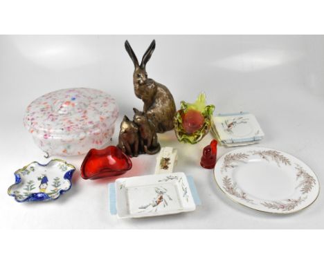 A quantity of decorative plates to include two Quimper plates, both hand painted, one with image of young woman picking flowe