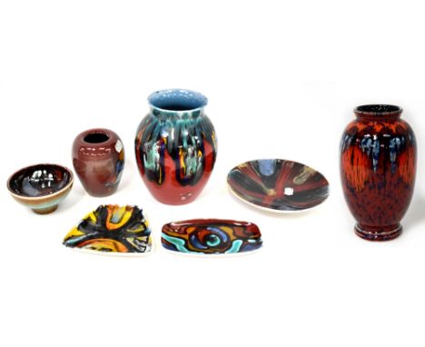 POOLE; a group of seven ceramics to include a Studio Kiln baluster vase, flambé ground with drip glaze decoration in vibrant 