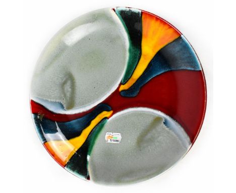 POOLE; a decorative plate in the 'Aurora' design by Alan Clarke, diameter 27cm.