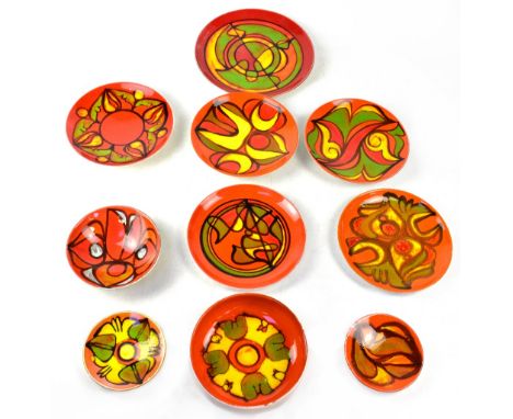 POOLE; a group of ten plates and bowls of varying sizes mainly in the 'Delphis' pattern, diameter of largest 25cm (10).
