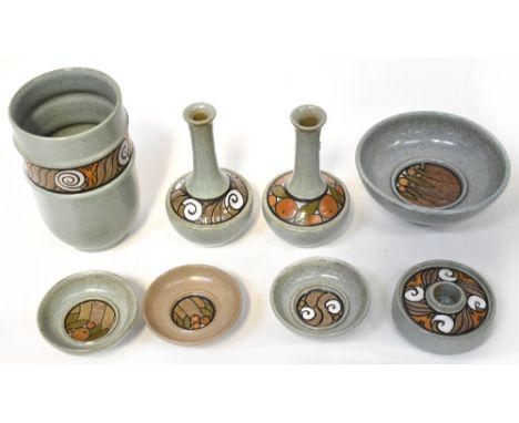POOLE; a group of decorative stoneware, aqua ground with band decoration of fruits and scrolls, to include a cylindrical vase