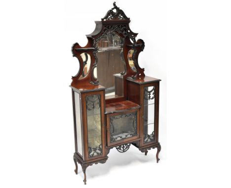 A Victorian mahogany mirror back display cabinet, shaped mirror above heavily carved canopy, with teardrop mirror to either s