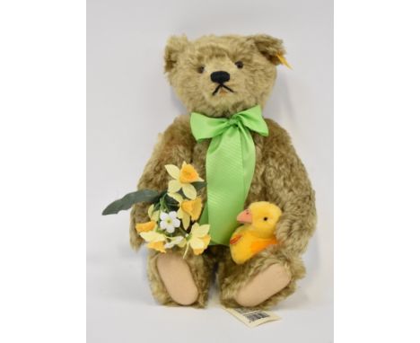 STEIFF; a modern light brown Steiff teddy bear, 'Dylan' from the 'Four Seasons' range, Spring Bear no.654466, with daffodils 