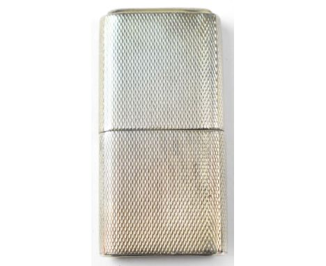 THE 'HOWITT' LIGHTER; a hallmarked silver petrol lighter with engine turned body, Dudley Russell &amp; Howitt, Sheffield 1944