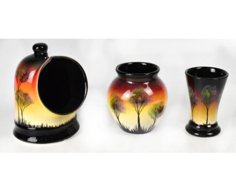 STUDIO POOLE; three ceramics in the 'African Skies' pattern to include a trumpet vase, height 13cm, a baluster, height 14cm, 