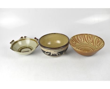 Three studio ceramic bowls comprising one with brown band and bamboo decoration in the Japanese style, impressed initials 'MW
