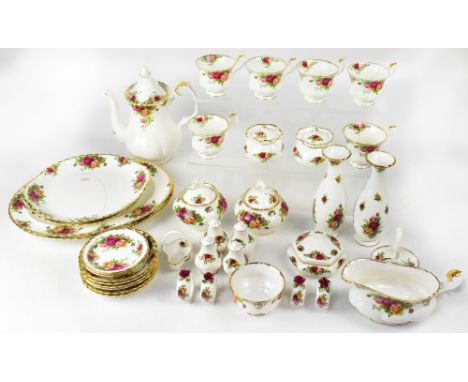 A Royal Albert 'Old Country Roses' part tea service with some matching decorative items and dinner ware to include teapot, si