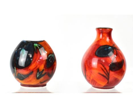 POOLE; two 'Himalayan Poppy' design vases, a small purse vase, height 11cm and a squat bud vase, 14.5cm (2).